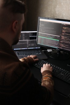 A developer working on code at a computer